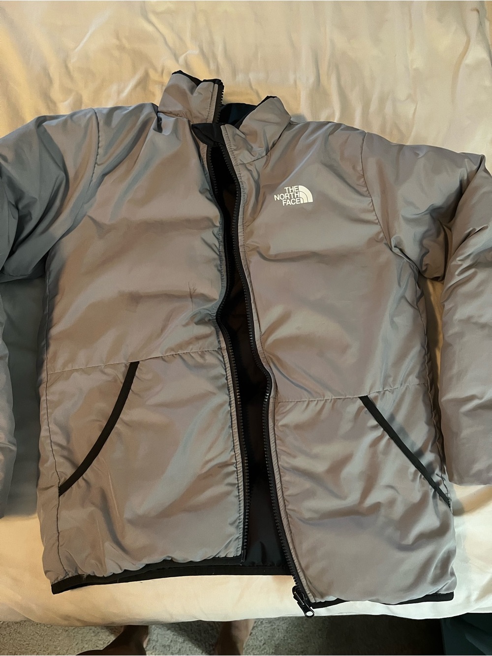 The North Face reversible youth L Light Gray Puffer Jacket
